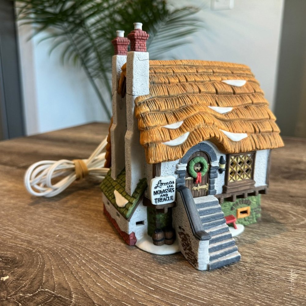 Dept 56 “Lomas Ltd. Molasses” Christmas Village Collection.
